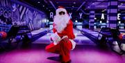 Santa doing bowling