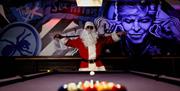 Santa playing Pool