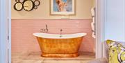 Copper bath in bathroom