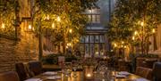 Warm light on table at Restaurant at Tortworth Court Hotel
