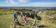 Family walking around Cheddar Gorge