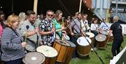 Team building group drumming