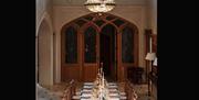 Dressed dinner table with chandelier