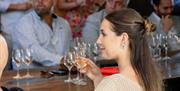 Woman having a glass of wine