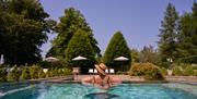 Lady in the swimming pool within the Spa at Lucknam Park in Thickwood, near Bath