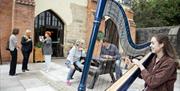 Vaulted Chambers Café with harpist outside