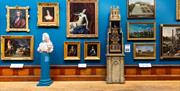 Some of the artworks inside the Upper Gallery at the Victoria Art Gallery in Bath, UK.