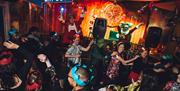 People partying and doing a conga