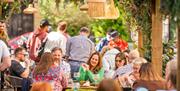 Guests having a cocktail outside