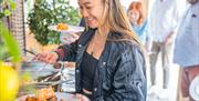 Guests enjoying the outdoor buffet