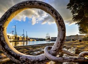 Image of Bristol Harbour taken through a chain ring