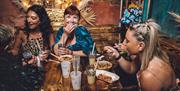 People eating in quirky cafe
